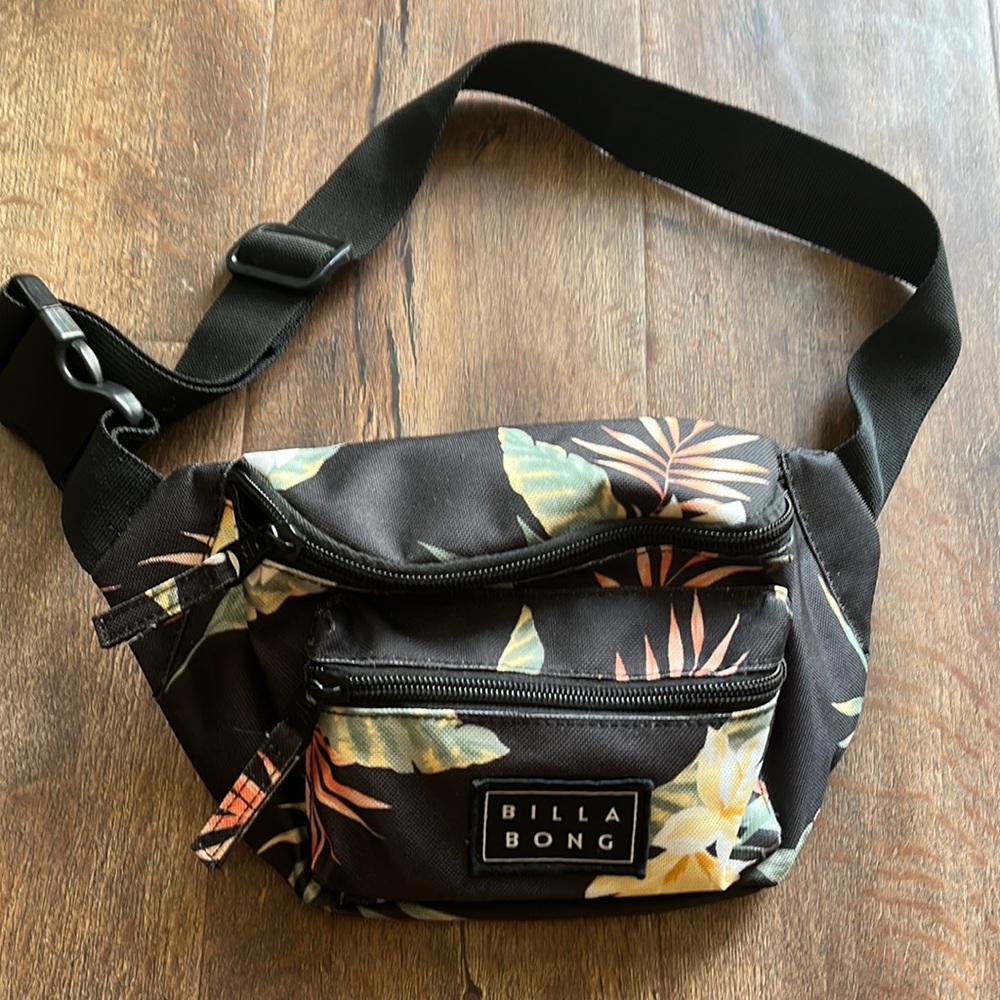 Brand New, never used Billabong fanny pack. Black with tropical floral print~
